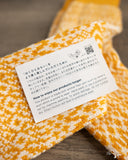 Nishiguchi Kutsushita Wool Jacquard Socks - Lantern Orange